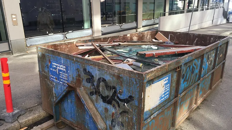 Dumpster filled with construction debris